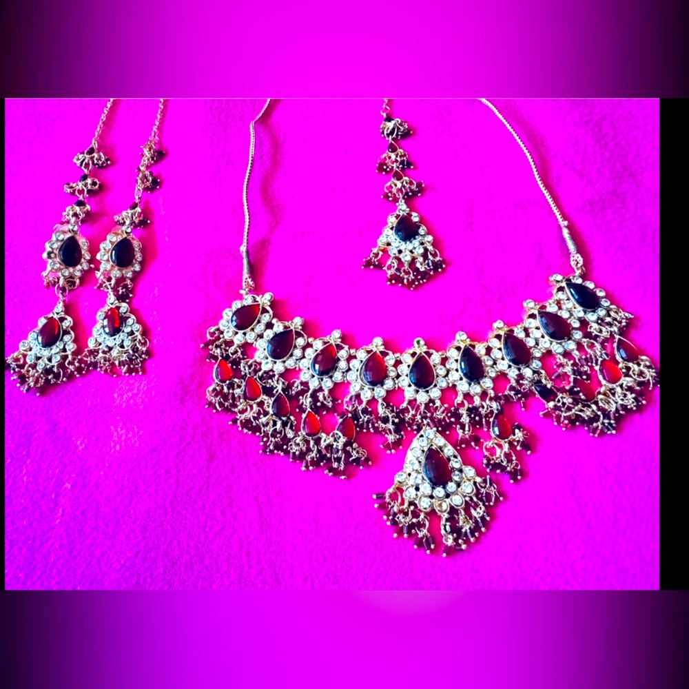 Elegant Gold and maroon bridal jewelry